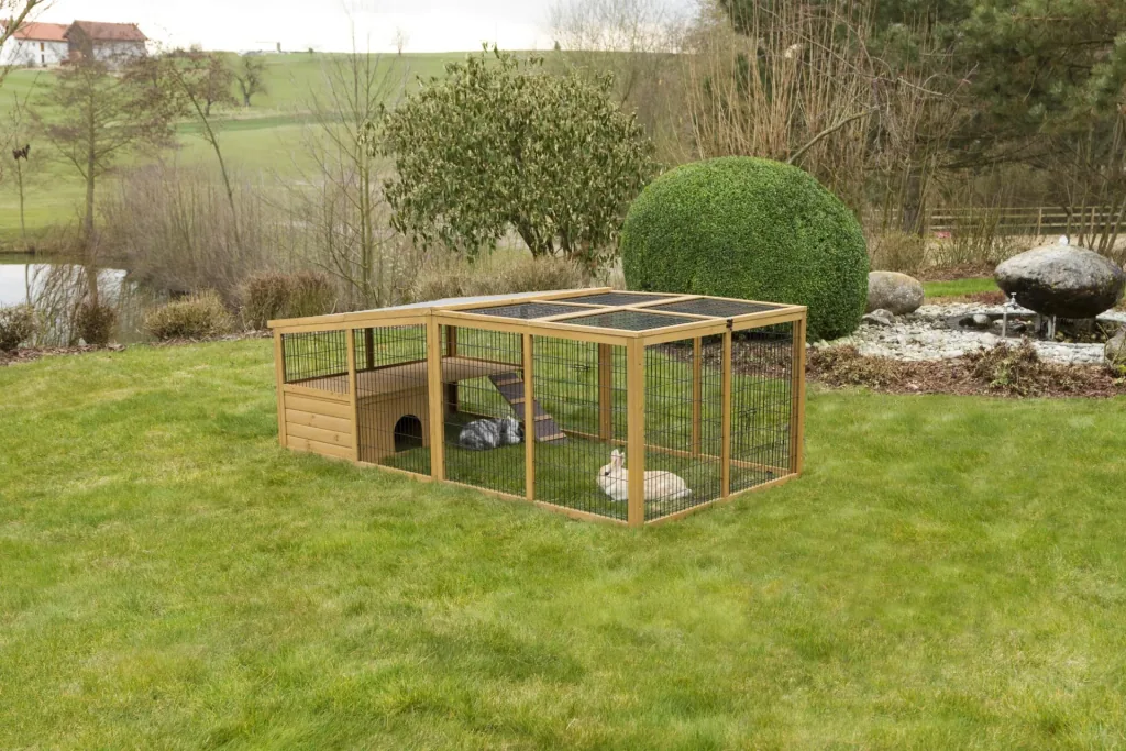 Outdoor enclosure with plastic roof & escape barrier