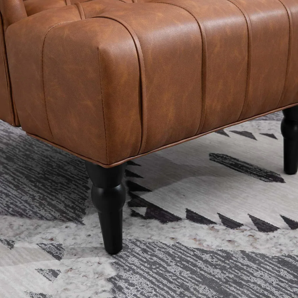 Wing chair with tufting