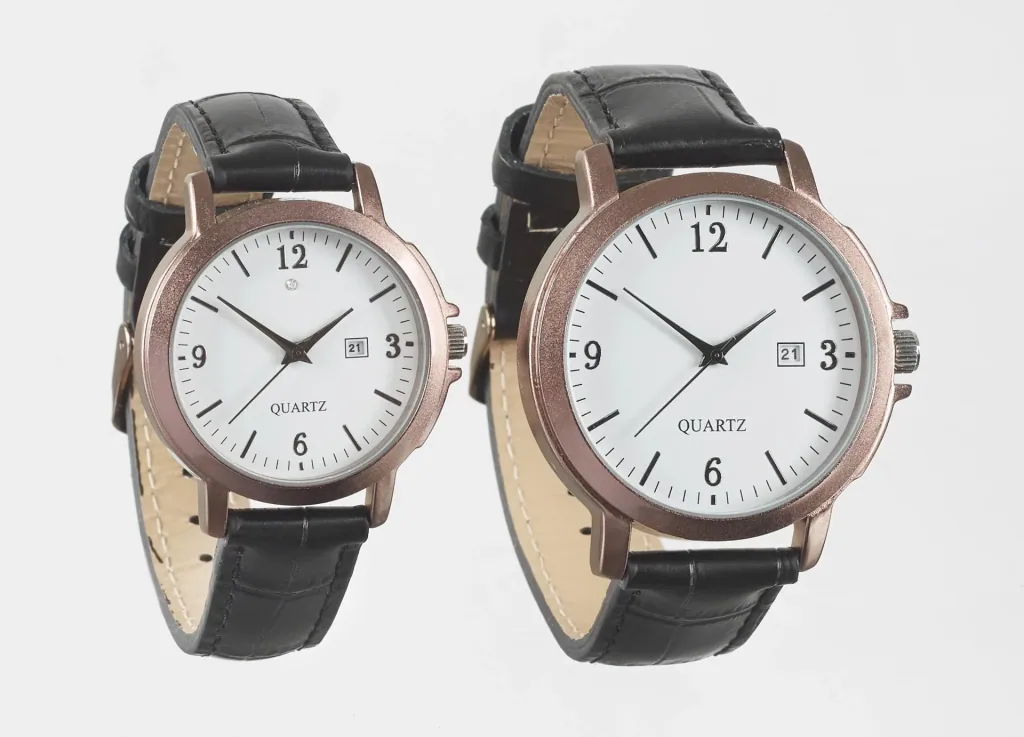 Watch set for him and her - bronze-colored with genuine leather strap and date display