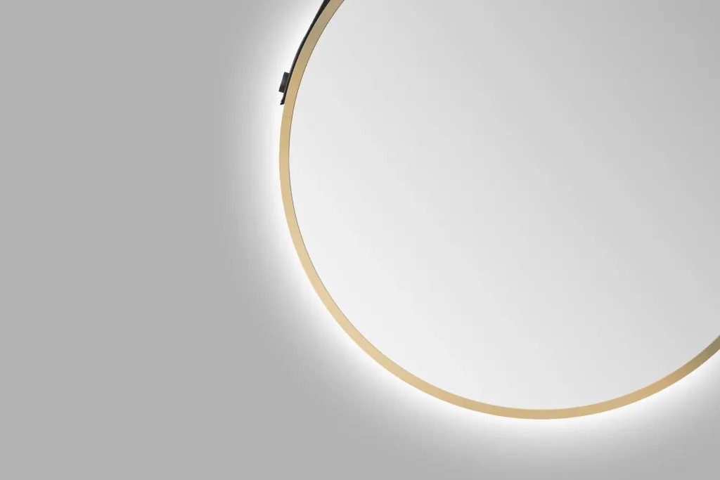 Decorative round wall mirror with indirect LED lighting in matt gold Ø 50 cm