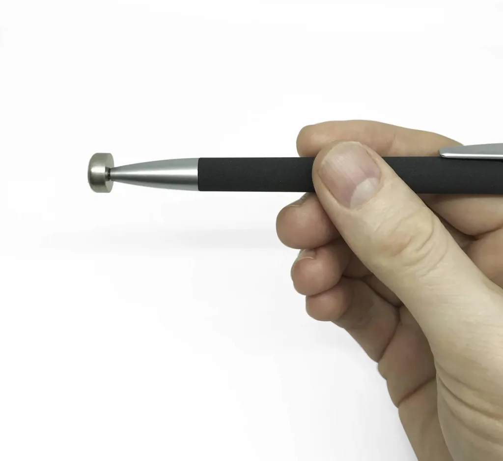 Magnetic pen for hearing aid batteries