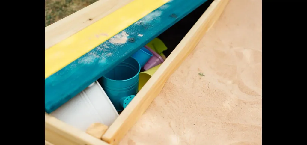 Wooden sandpit with storage box, outdoor sandpit for children made of wood, bench, seating area, colorful