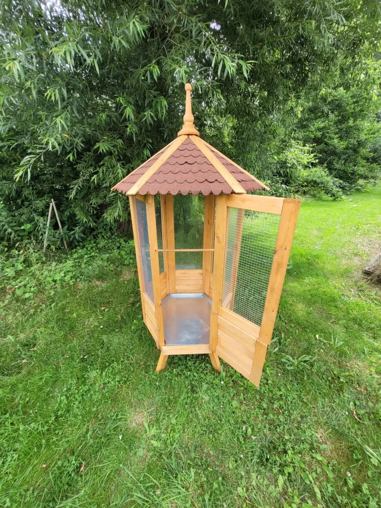 Hexagonal aviary with bitumen roof