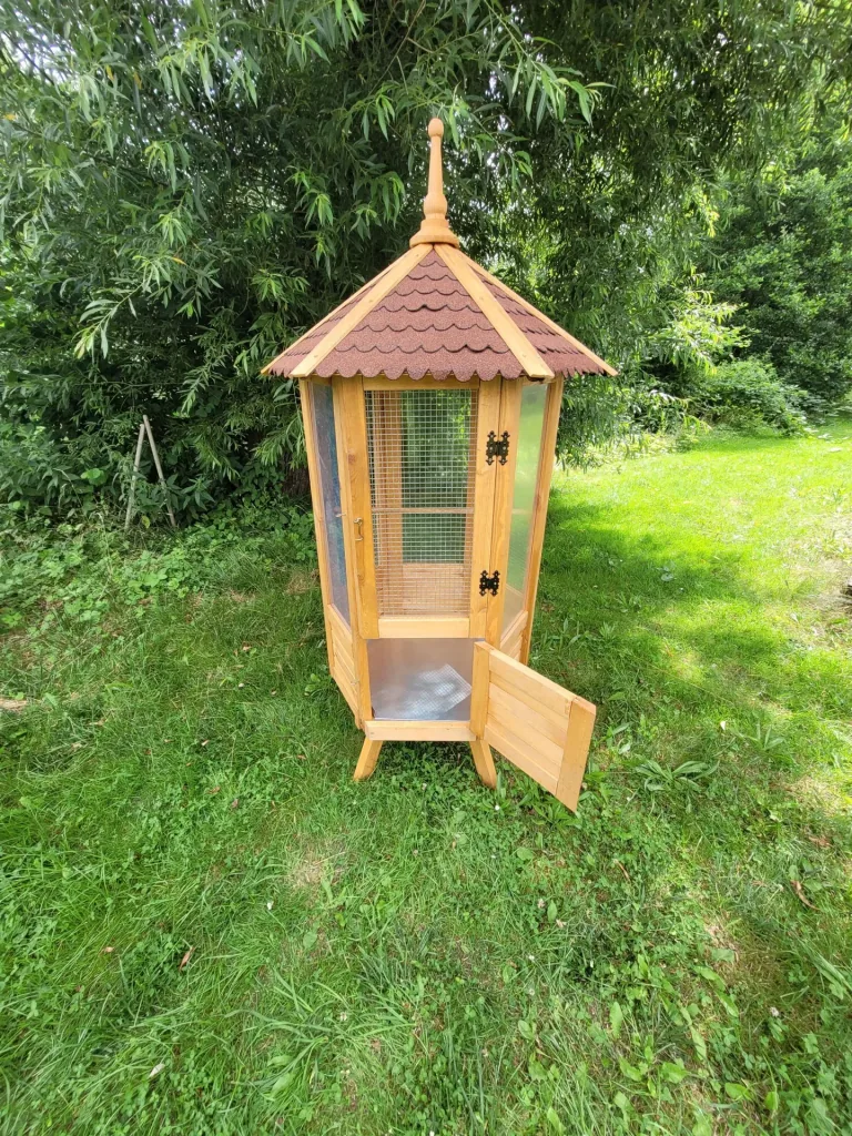 Hexagonal aviary with bitumen roof