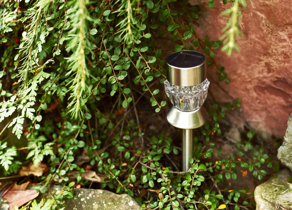 Solar LED light with ground spike