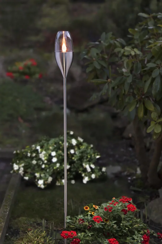 Solar garden light with flickering amber LED, pluggable
