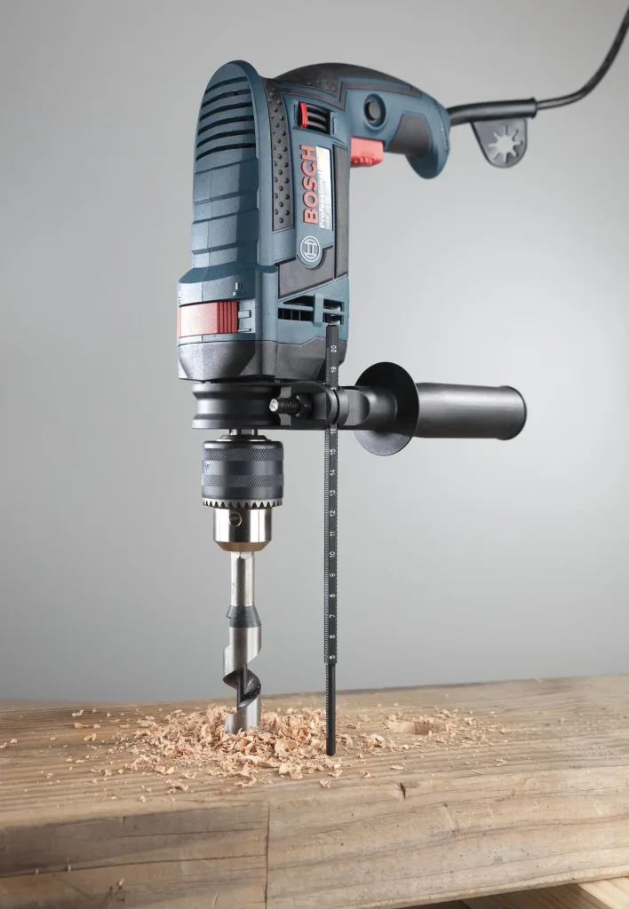 Impact drill GSB 16 RE, 750 watts, including 100-piece accessory set