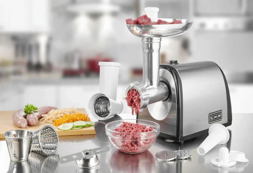 Stainless steel meat grinder with cookie attachment and vegetable cutting attachment