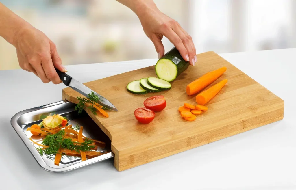 Bamboo cutting board with stainless steel drip tray