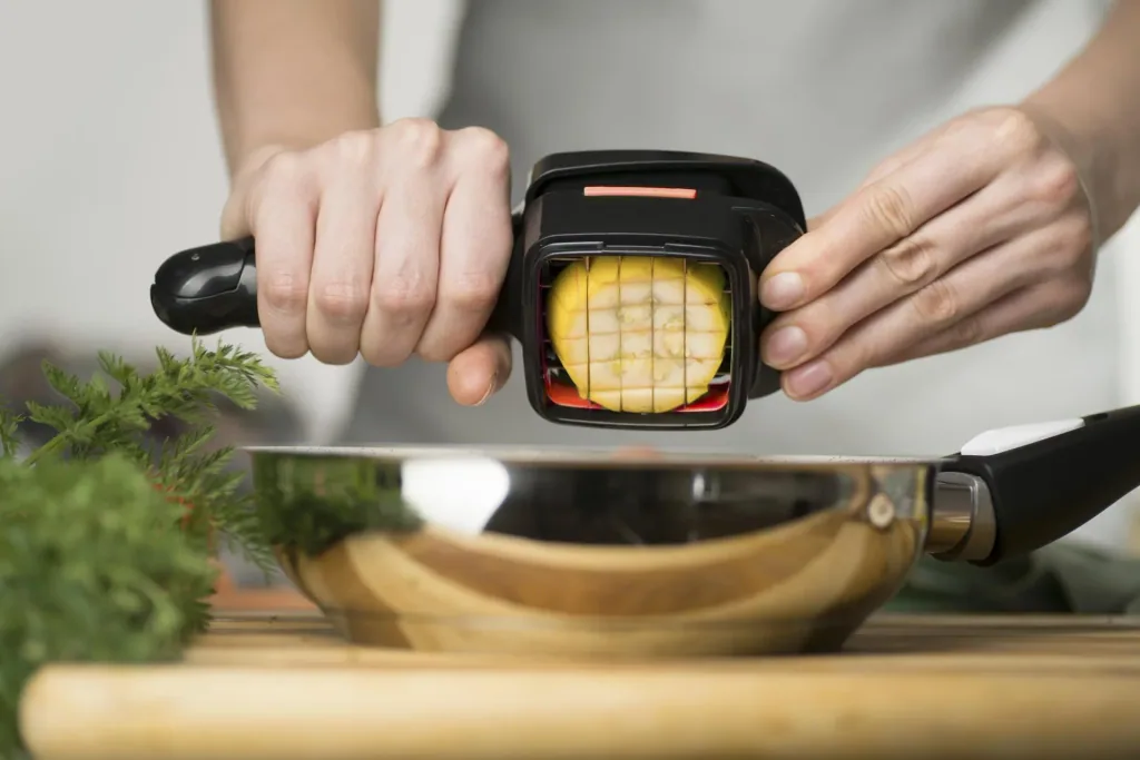 5-in-1 vegetable cutter “Nicer Dicer Quick”, handheld, black/orange, 5-piece