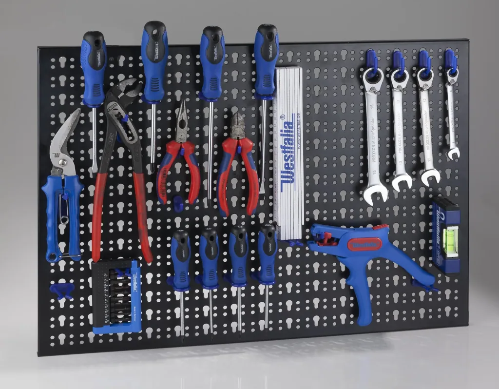 Perforated metal tool wall with 24 tool hooks