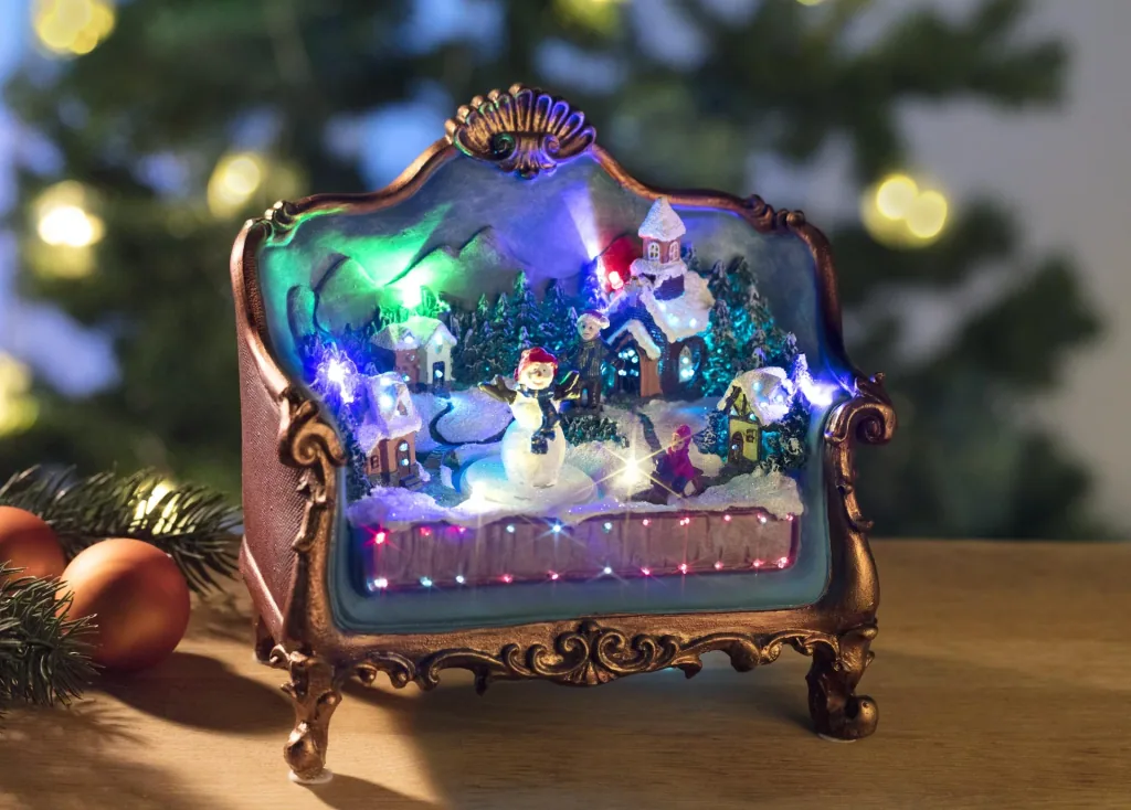 Sofa with Christmas scene with lighting and music