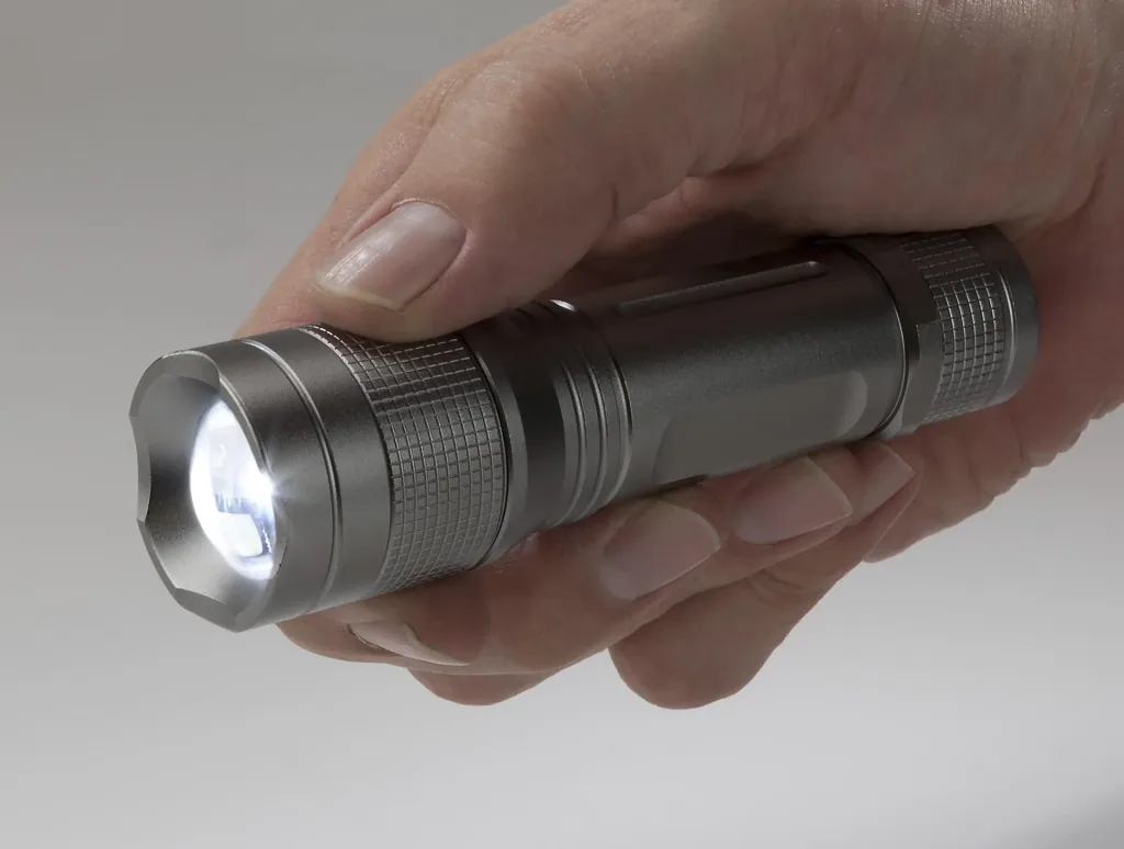 Aluminum flashlight with zoom, 5 W Cree LED, splash-proof according to IPX4