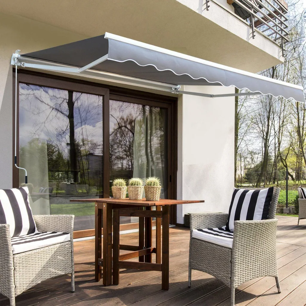 Articulated arm awning with hand crank