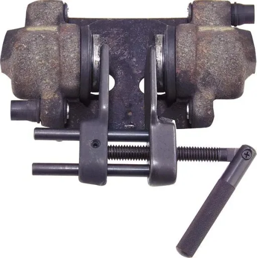 Disc brake piston retractor