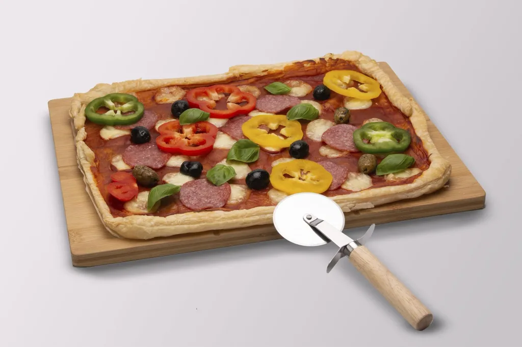 Pizza cutting board with pizza cutter