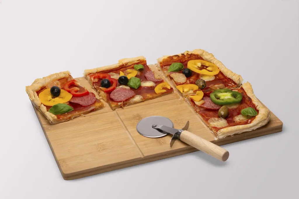Pizza cutting board with pizza cutter