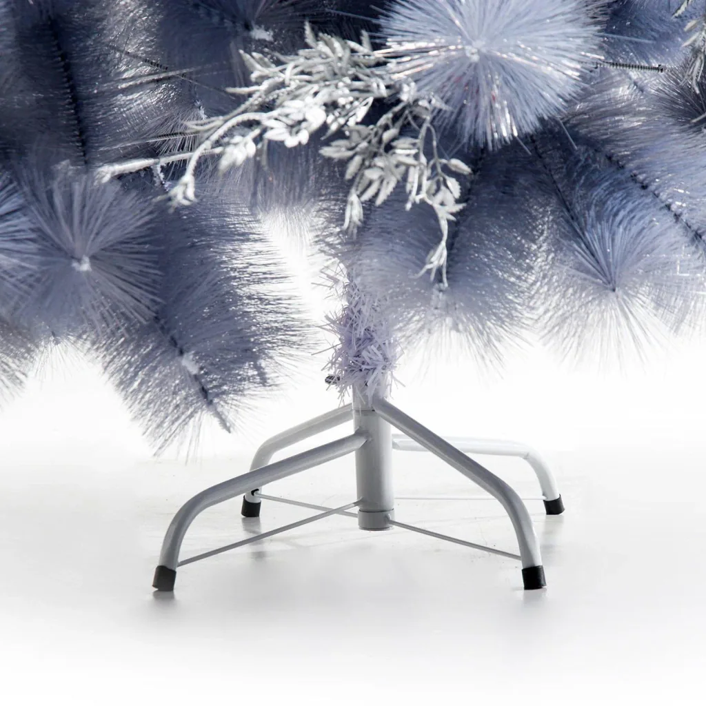 Artificial Christmas tree with silver branches and red berries