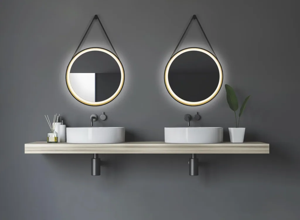 Decorative round wall mirror with LED lighting in black/gold matt Ø 55 cm