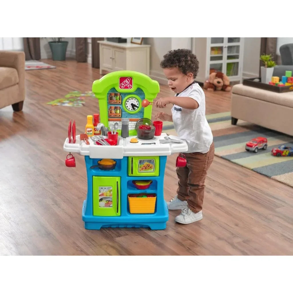 Little Cooks Kitchen play kitchen including 21-piece accessory set