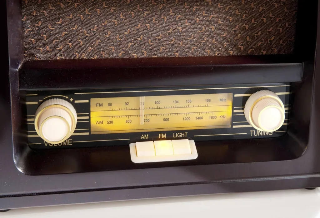 Nostalgic radio with real wood case and amber-colored buttons