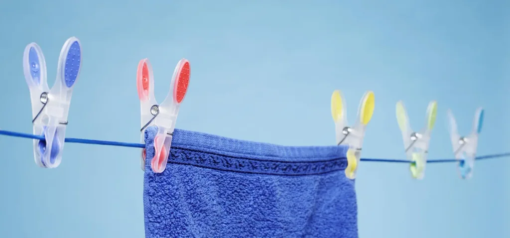 20-piece clothespin set in a bag
