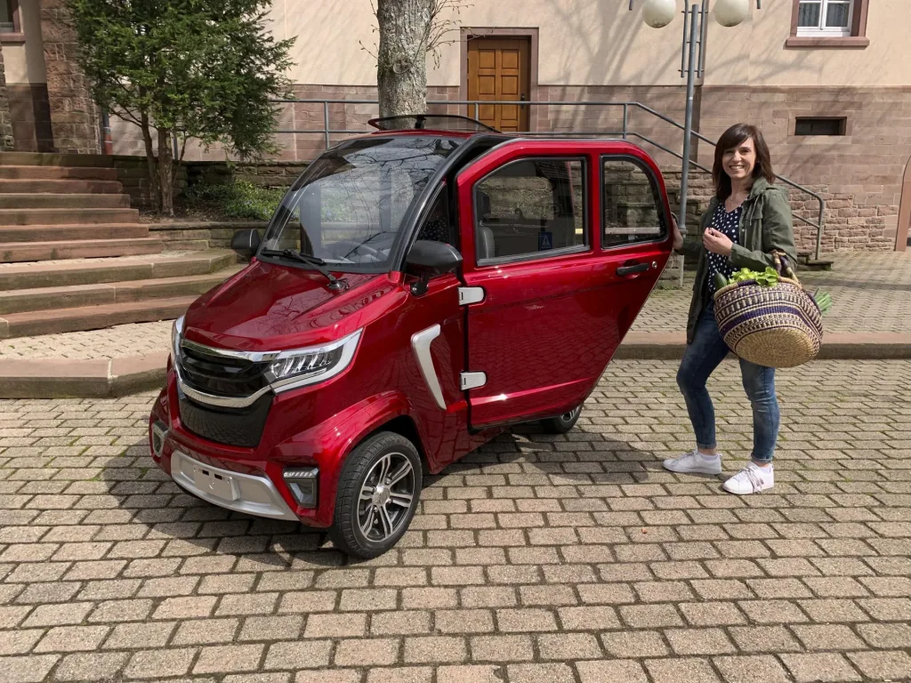 4-wheel electric cabin vehicle eLazzy Premium 45 km/h red, with free on-site instruction