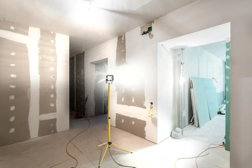 LED construction spotlight with telescopic tripod, various designs