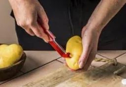 Sharple peeler with self-sharpening system, red