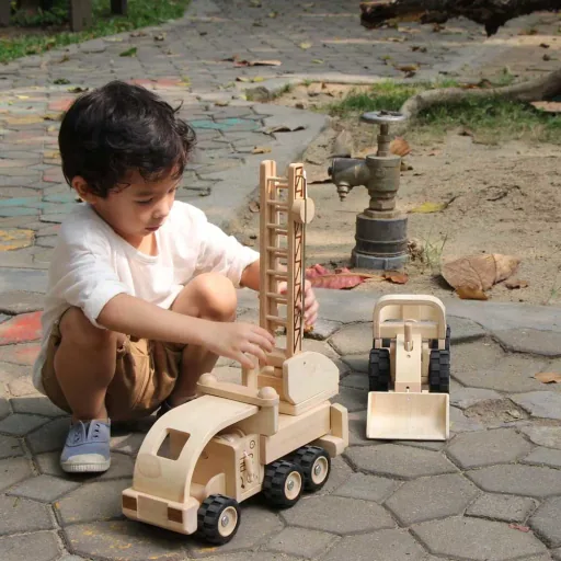 Houten kindergraver van Plan Toys Bagger