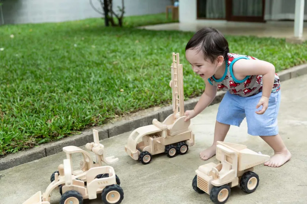 Houten kindergraver van Plan Toys Bagger