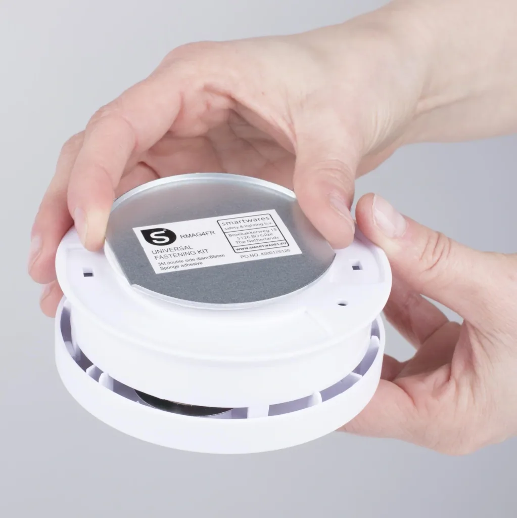 Magnetic attachment for smoke detectors