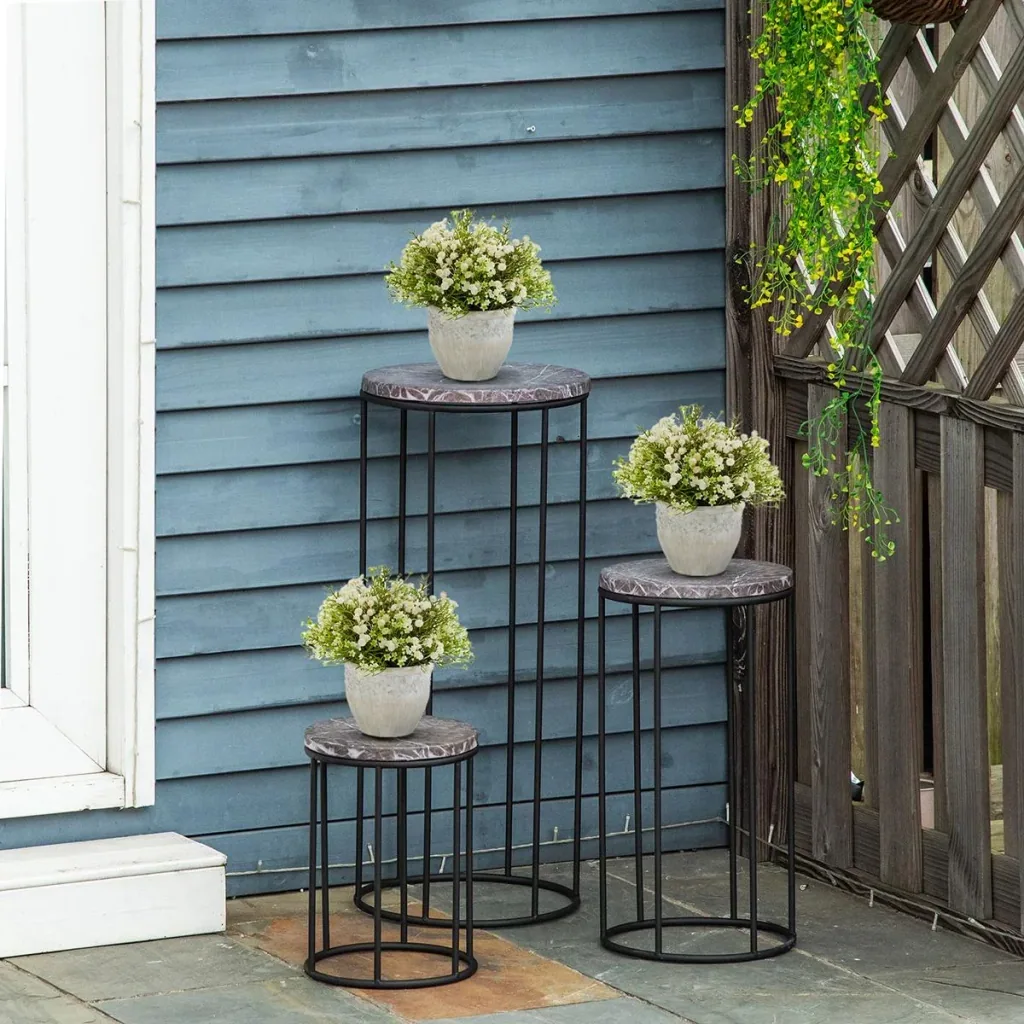 Flower stand set of 3 made of metal in marble look. Stackable plant stool for flower pot. Black + gray.