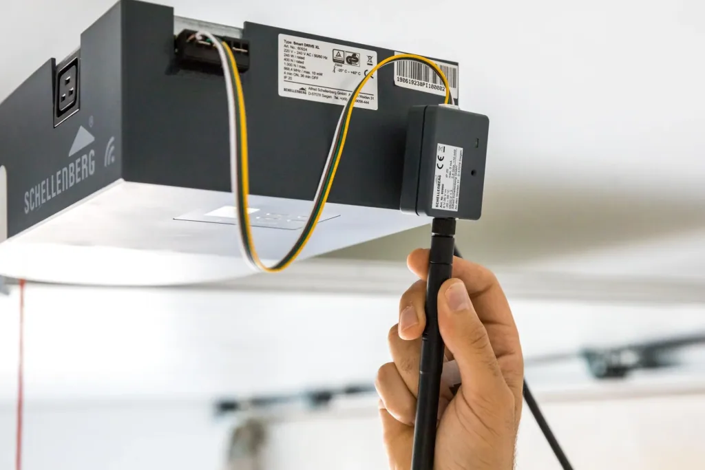 Smartphone garage door opener with LED