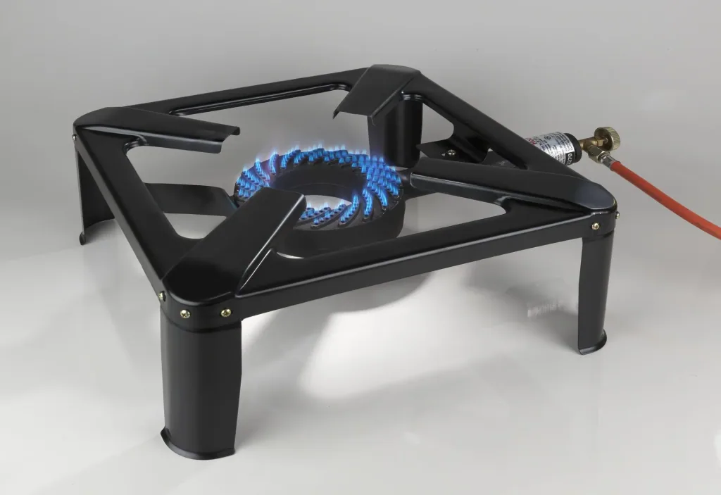 Stool cooker including hose and regulator