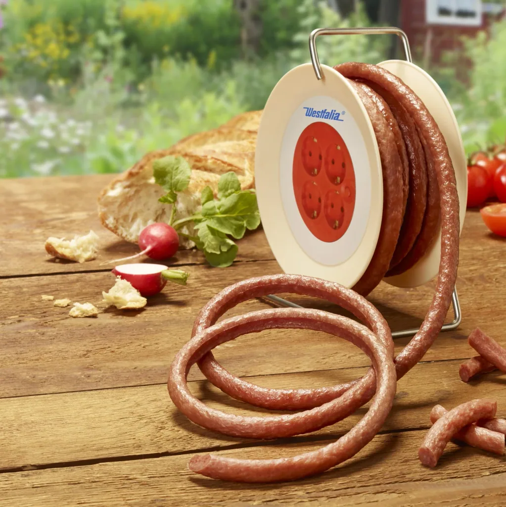 Snack sausage on cable drum