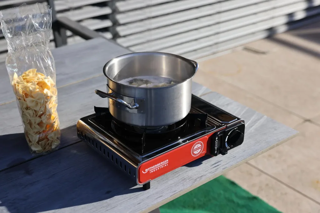 Compact gas table cooker Premium RS 220 with integrated cartridge compartment
