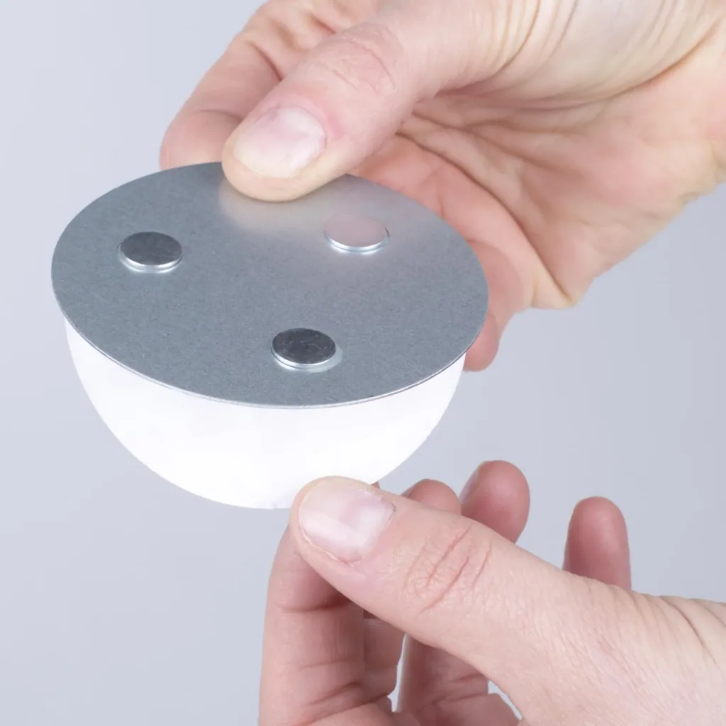 Magnetic attachment for smoke detectors