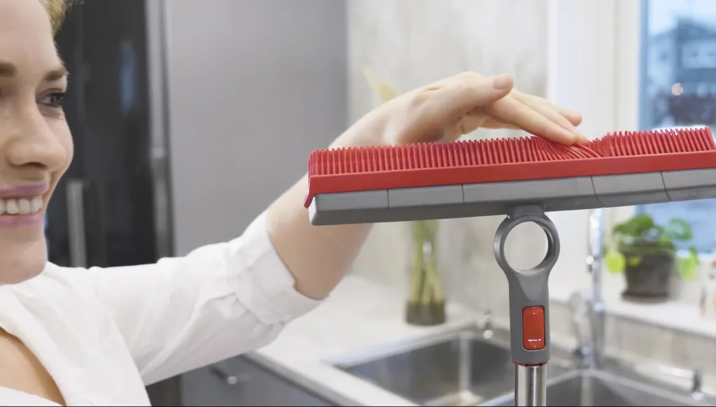 Rubber broom attachment with squeegee