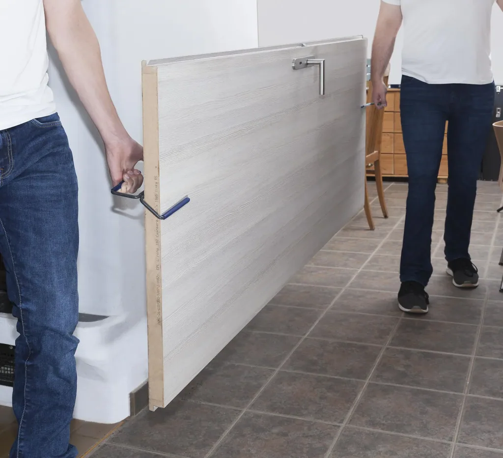 Universal lifting handle for doors, panels and other flat objects