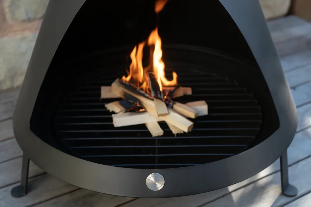 Fireplace including smoke outlet black