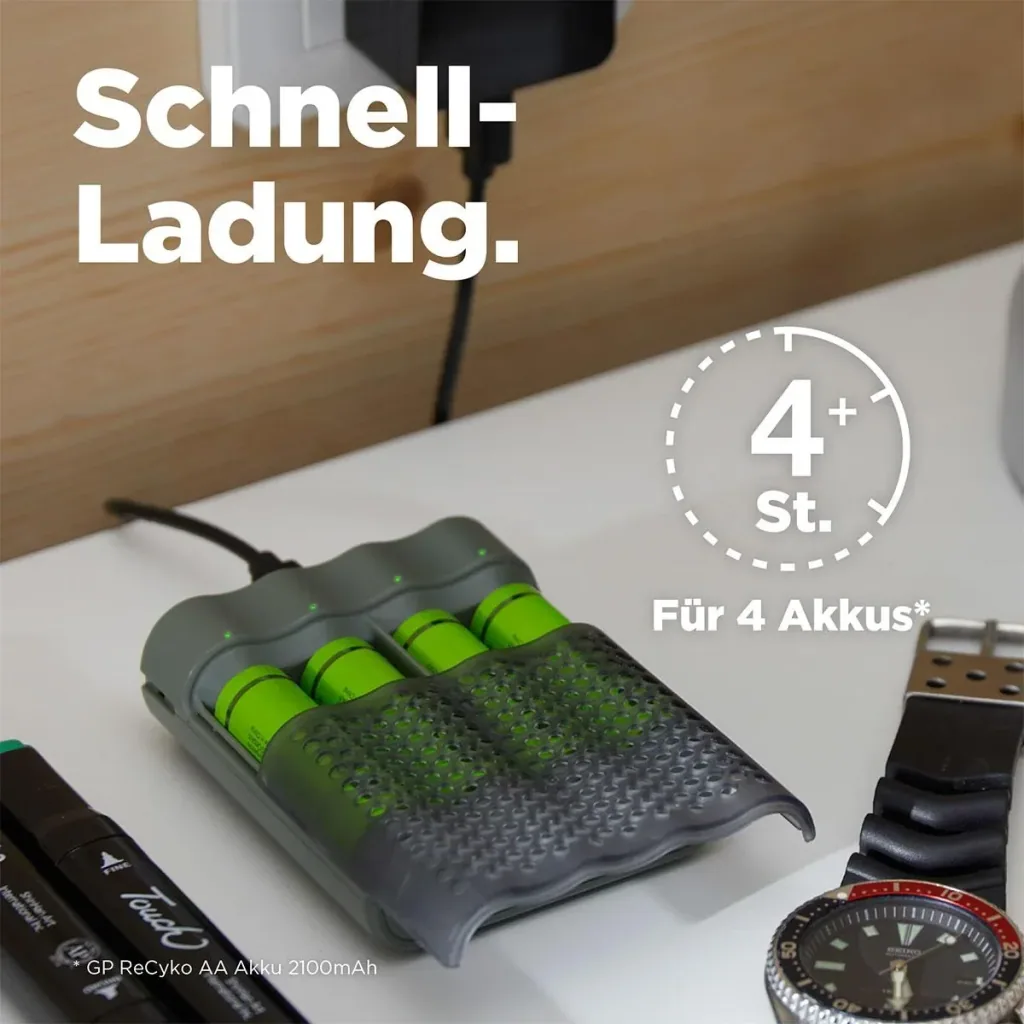 USB fast charger for 4 AA / AAA NiMH batteries including 4 ReCyko Mignon (AA) NiMH batteries with 2600 mAh