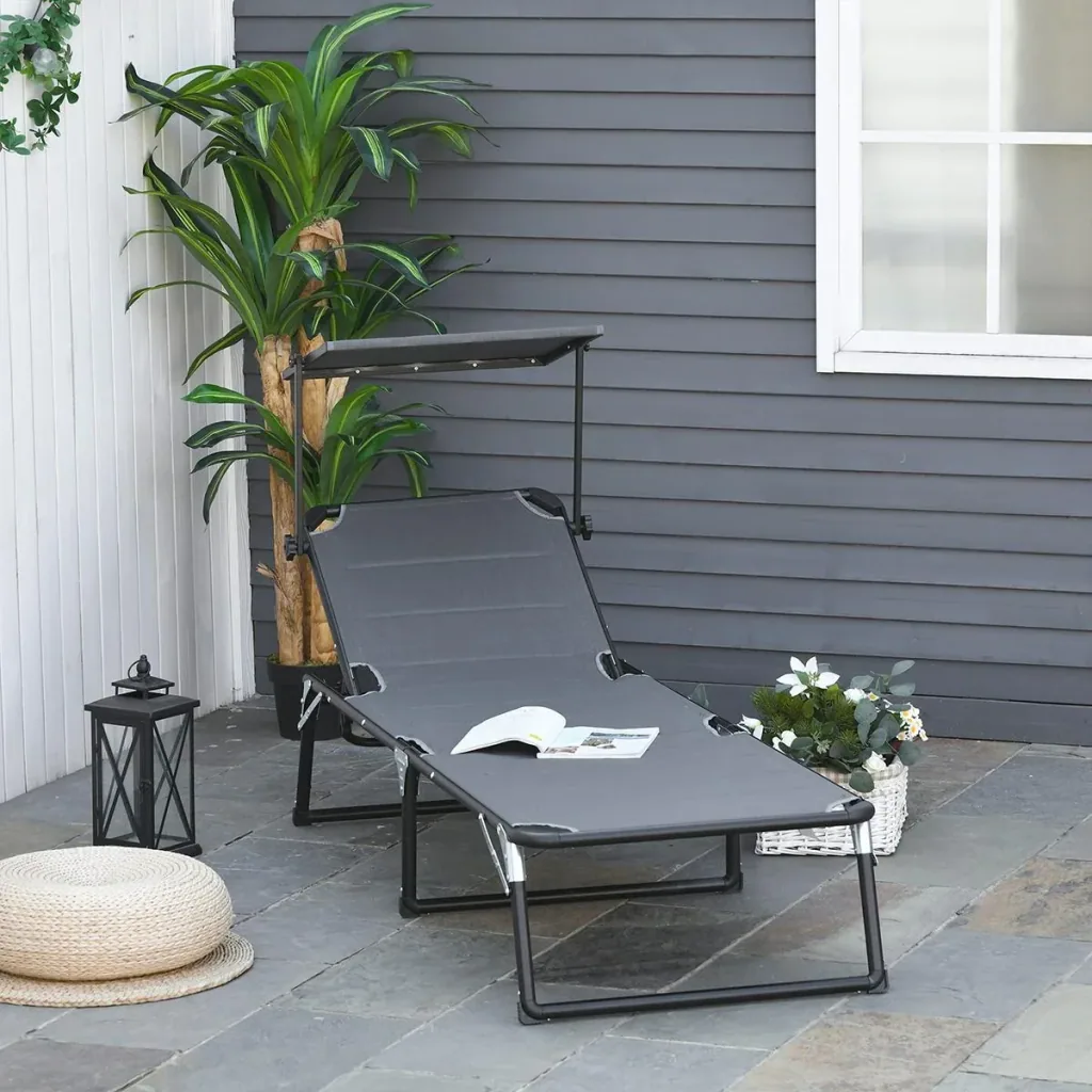 Garden lounger with sun protection dark grey