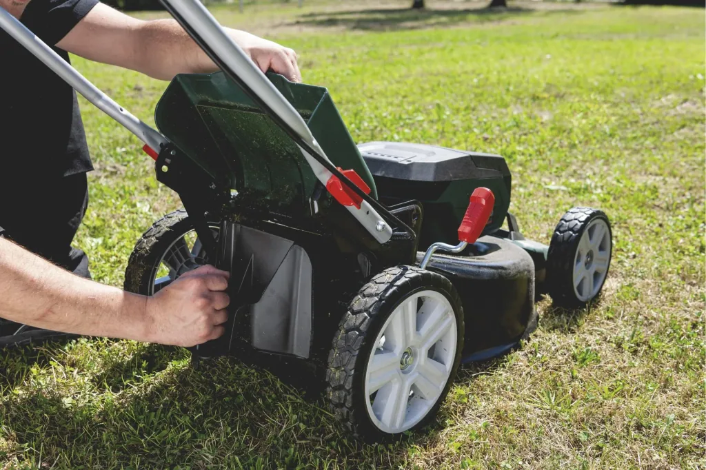 Cordless lawn mower RM 36-18 LTX BL 46 2x 5.2 Ah, charger ASC 145 Duo
