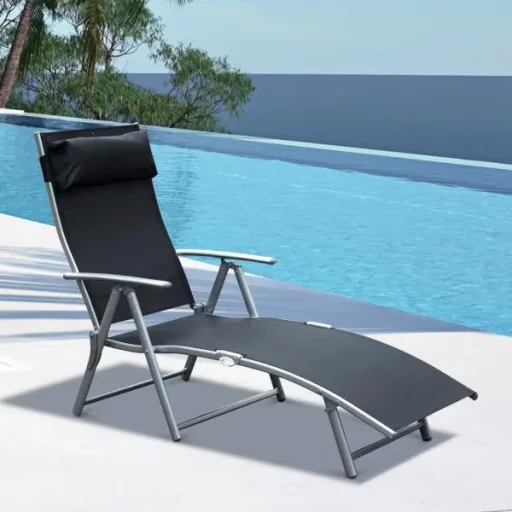 Folding sun lounger with cushion black