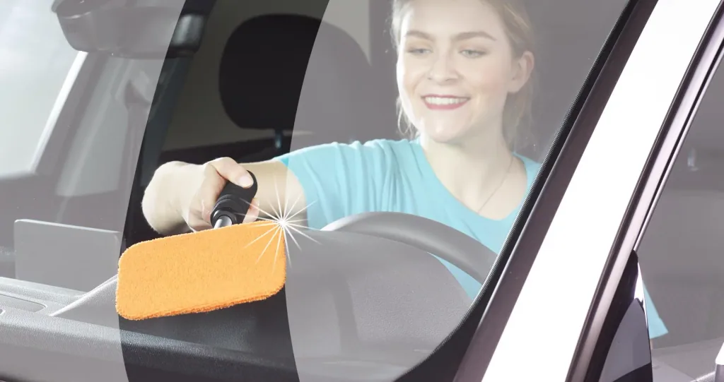 Car window interior cleaner including spray bottle and microfiber cover