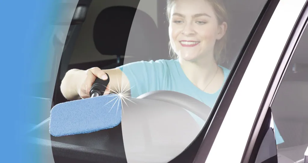 Car window interior cleaner including spray bottle and microfiber cover