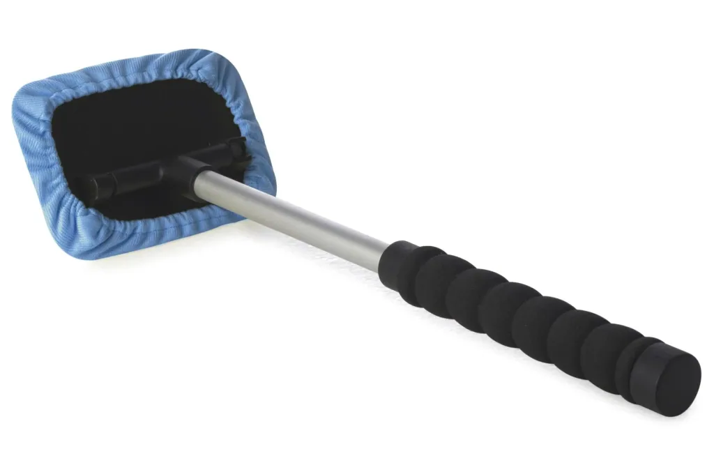 Car window interior cleaner including spray bottle and microfiber cover