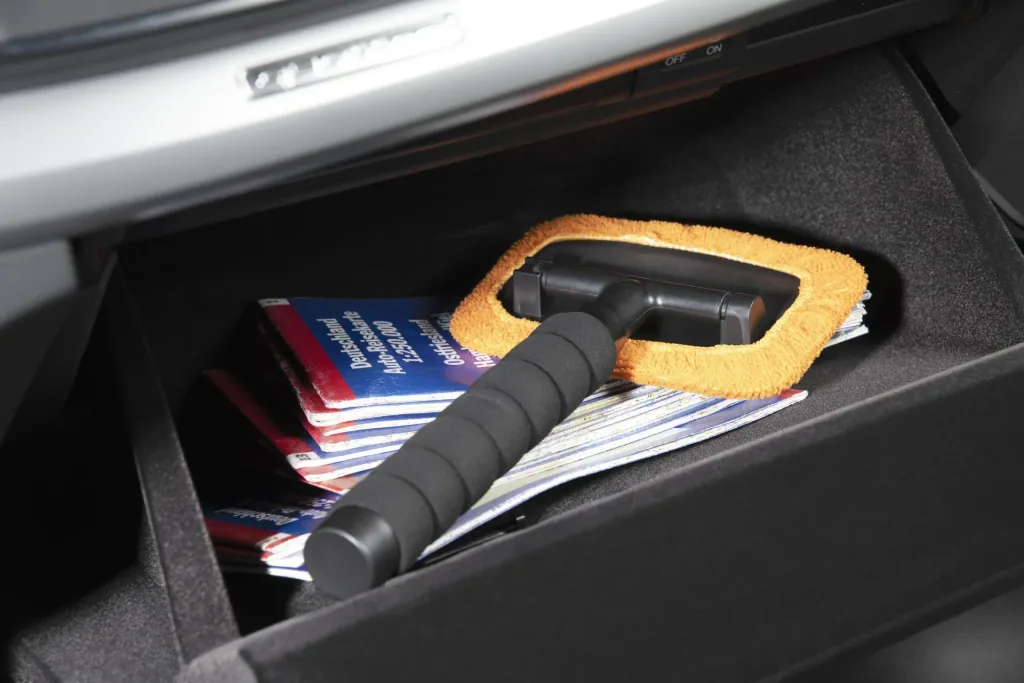 Car window interior cleaner including spray bottle and microfiber cover
