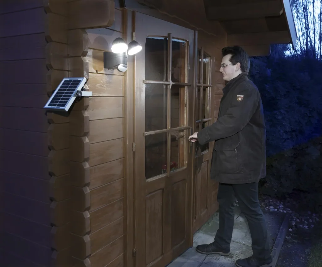 Duo spotlight with solar panel and motion detector